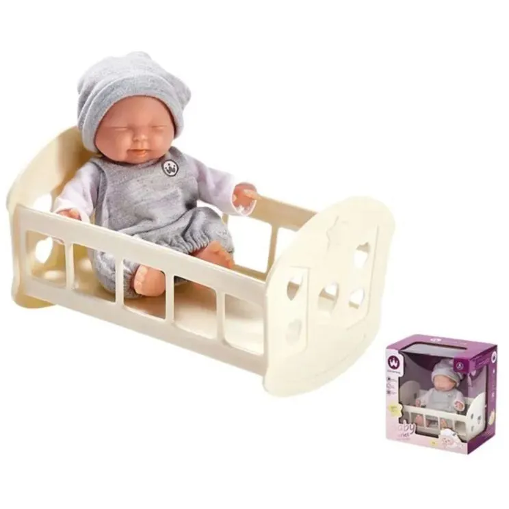 Іграшкове ліжечко з лялькою