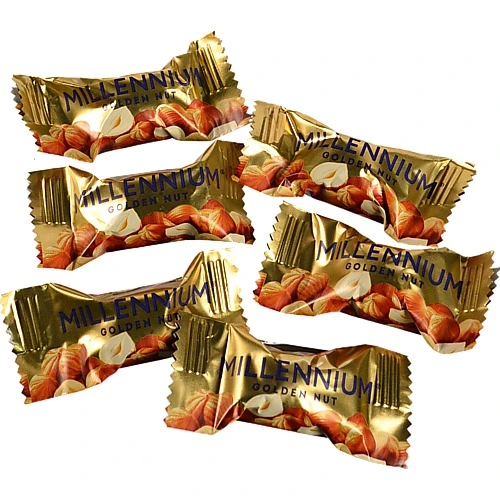Цукерки шоколадні з начинкою та цілими горіхами Golden Nut Millennium кг
